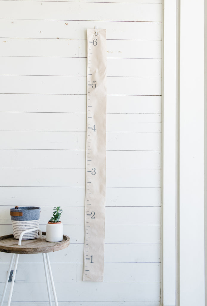 growth-chart-hanging-in-shiplap-baby-room-farmhouse-style-decor-for-the-home